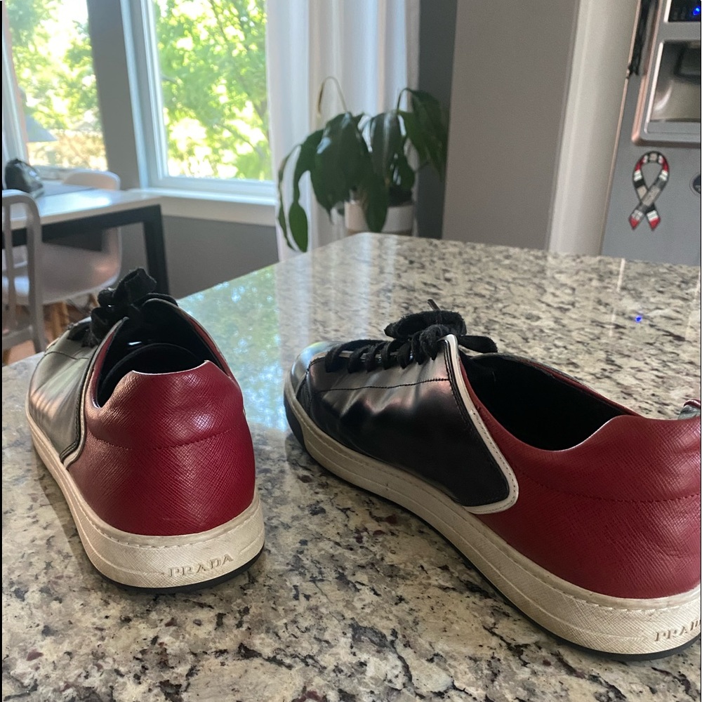 Prada 4E 2569, Colors: Black, White, Red. Decent Condition Does not include box.